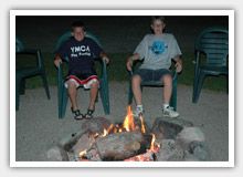Sitting around the campfire ring at Garden Lake Resort